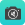 Black camera on blue