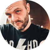 Man with beard and black shirt