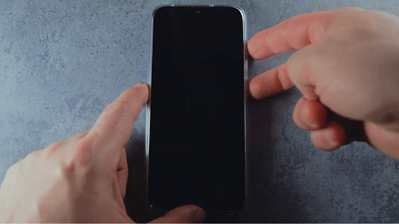 Press the Volume up + Power button simultaneously.